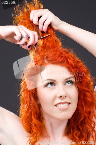 Image of redhead with scissors