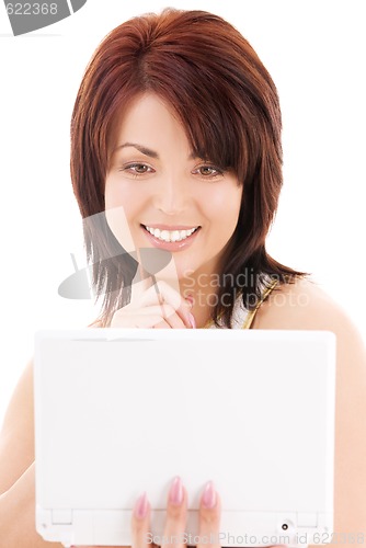 Image of happy woman with laptop computer