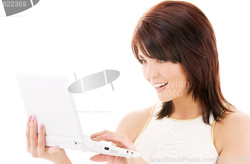 Image of happy woman with laptop computer