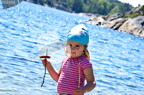 Image of Little girl at the sea