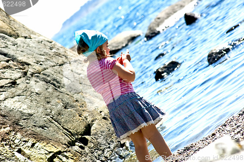 Image of Little girl at the sea