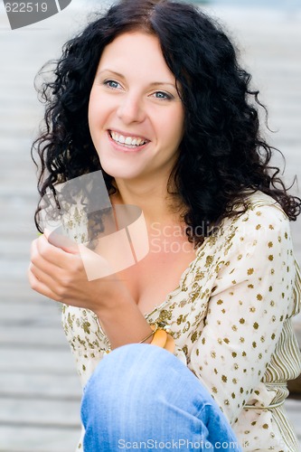 Image of happy brunet woman