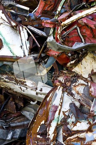 Image of old rusting cars in a junk yard