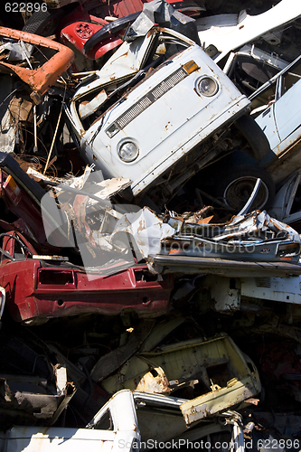 Image of old rusting cars in a junk yard