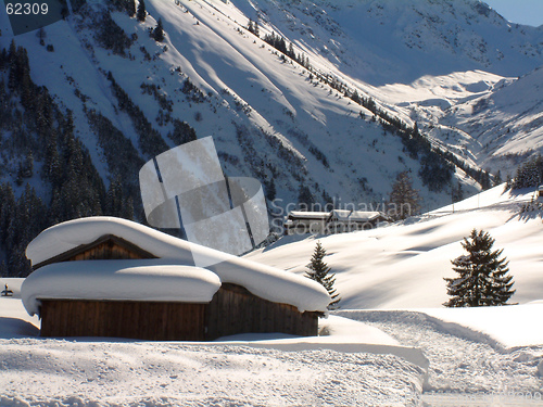 Image of Alpine hut in snow