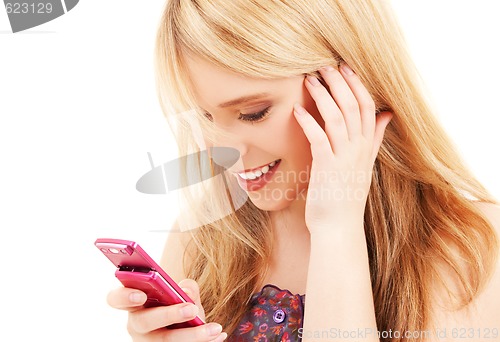 Image of happy teenage girl with cell phone