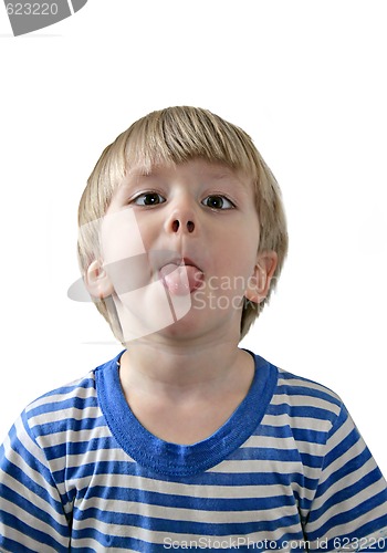 Image of Little boy sticking out his tongue