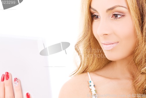 Image of happy woman with laptop computer