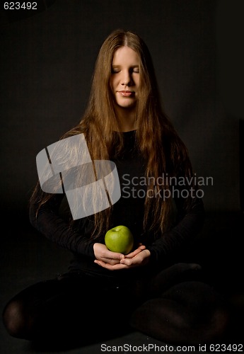 Image of Woman with green apple