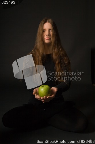 Image of Woman with green apple
