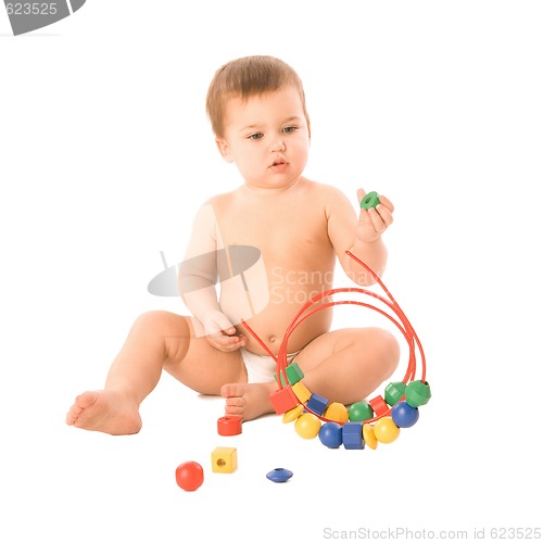 Image of Boy with multicolored cubes