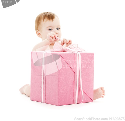 Image of baby boy with big gift box