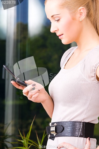 Image of lovely woman with cell phone