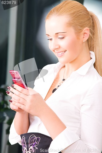 Image of lovely woman with cell phone