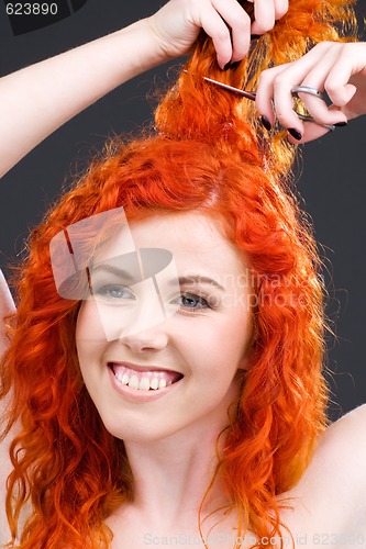 Image of redhead with scissors