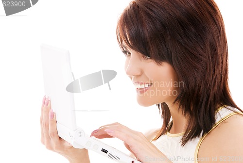 Image of happy woman with laptop computer