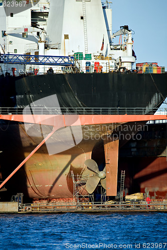 Image of container ship in dry dock