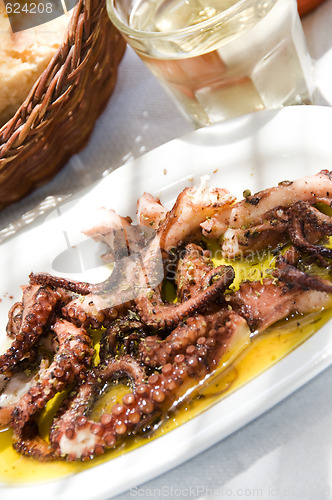 Image of marinated grilled octopus taverna food specialty greek islands