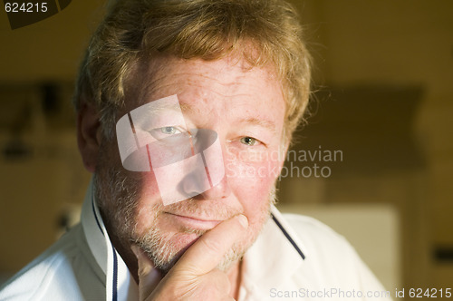 Image of middle age handsome man thoughtful portrait