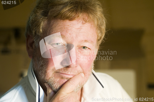 Image of middle age handsome man thoughtful portrait
