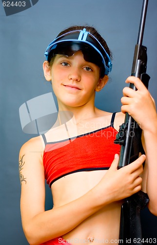 Image of Teen Girl and gun
