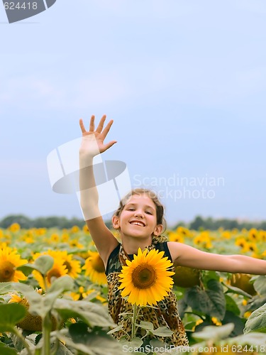 Image of Beauty teen girl with sunflower