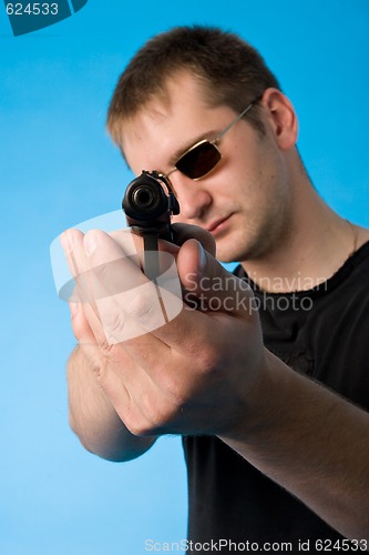 Image of shooting man