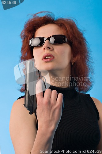 Image of woman with pistol