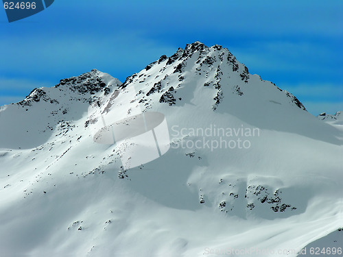 Image of Mountains in a snow.