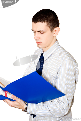 Image of The young man reads documents