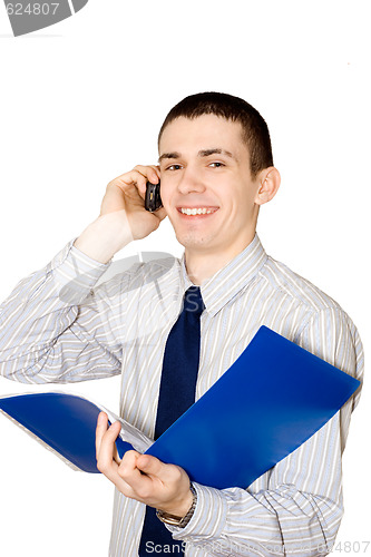 Image of The young man speaks to phone