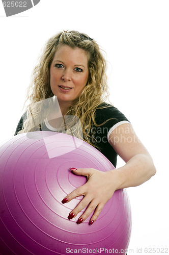 Image of pretty middle age woman exercising with dumbells