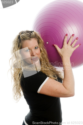 Image of pretty middle age woman exercising with dumbells