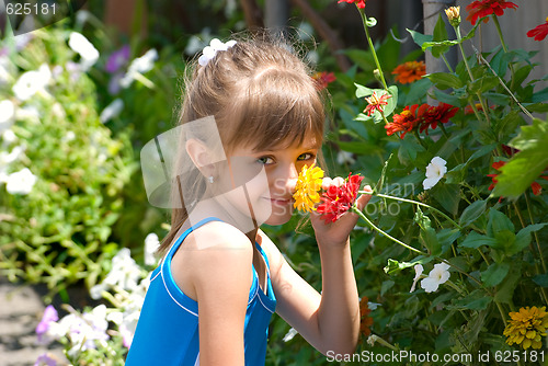 Image of The girl with flowers