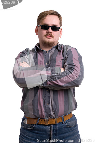 Image of man in black glasses
