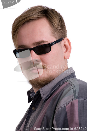 Image of man in black glasses