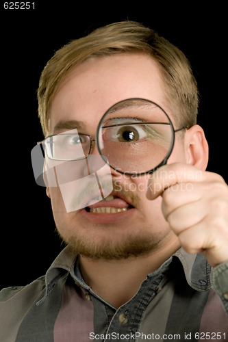 Image of man with loupe