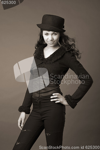Image of woman in black hat