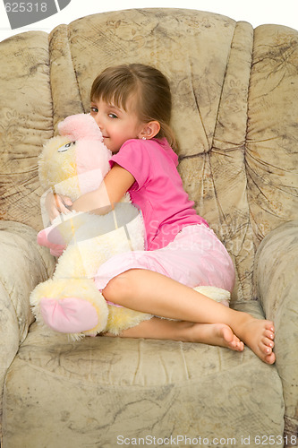 Image of The girl in an armchair