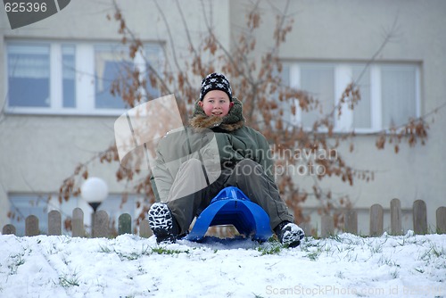 Image of Boy on sled