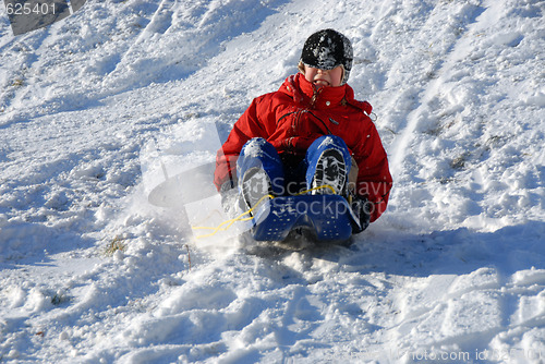 Image of Boy on sled