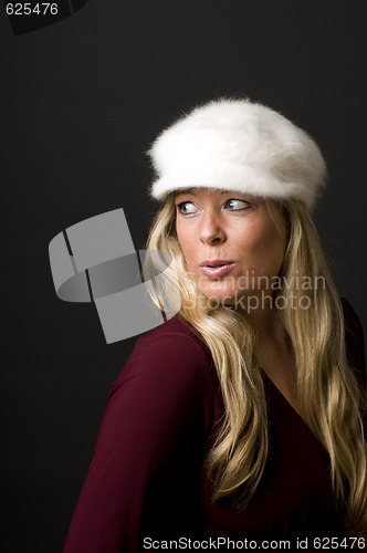 Image of sexy blond woman with fashion hat