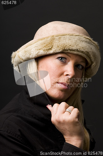 Image of sexy blond woman with fashion hat