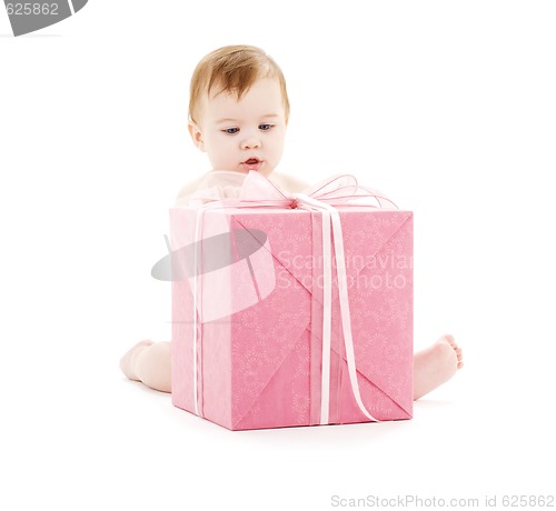 Image of baby boy with big gift box