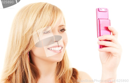 Image of happy teenage girl with cell phone