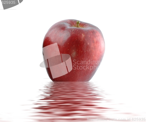 Image of Wet juicy red  apple over water. Isolated