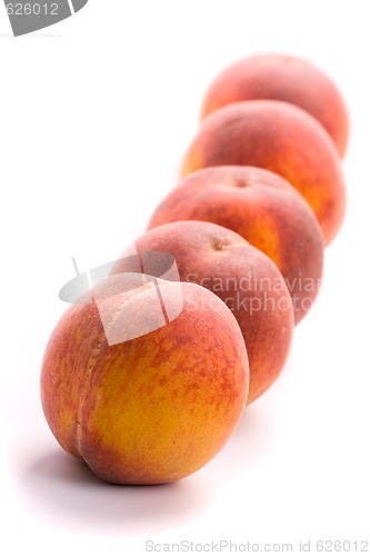 Image of five peaches