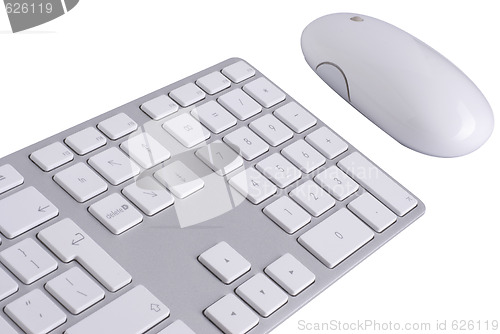 Image of White keyboard and mouse isolated against white background