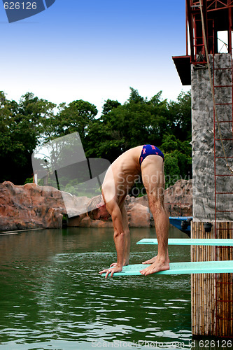 Image of PHUKET - AUGUST 11: Phuket Stunt Show diver rehearses for the sh