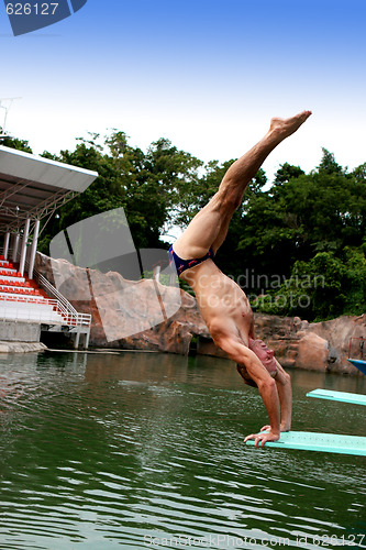 Image of PHUKET - AUGUST 11: Phuket Stunt Show diver rehearses for the sh